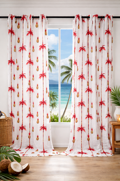 Caribbean curtains with palm trees and pineapple tropical design over window with ocean view